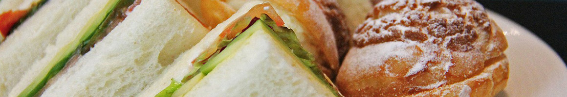 Eating Breakfast & Brunch Sandwich at Einstein Bros Bagels restaurant in Naples, FL.